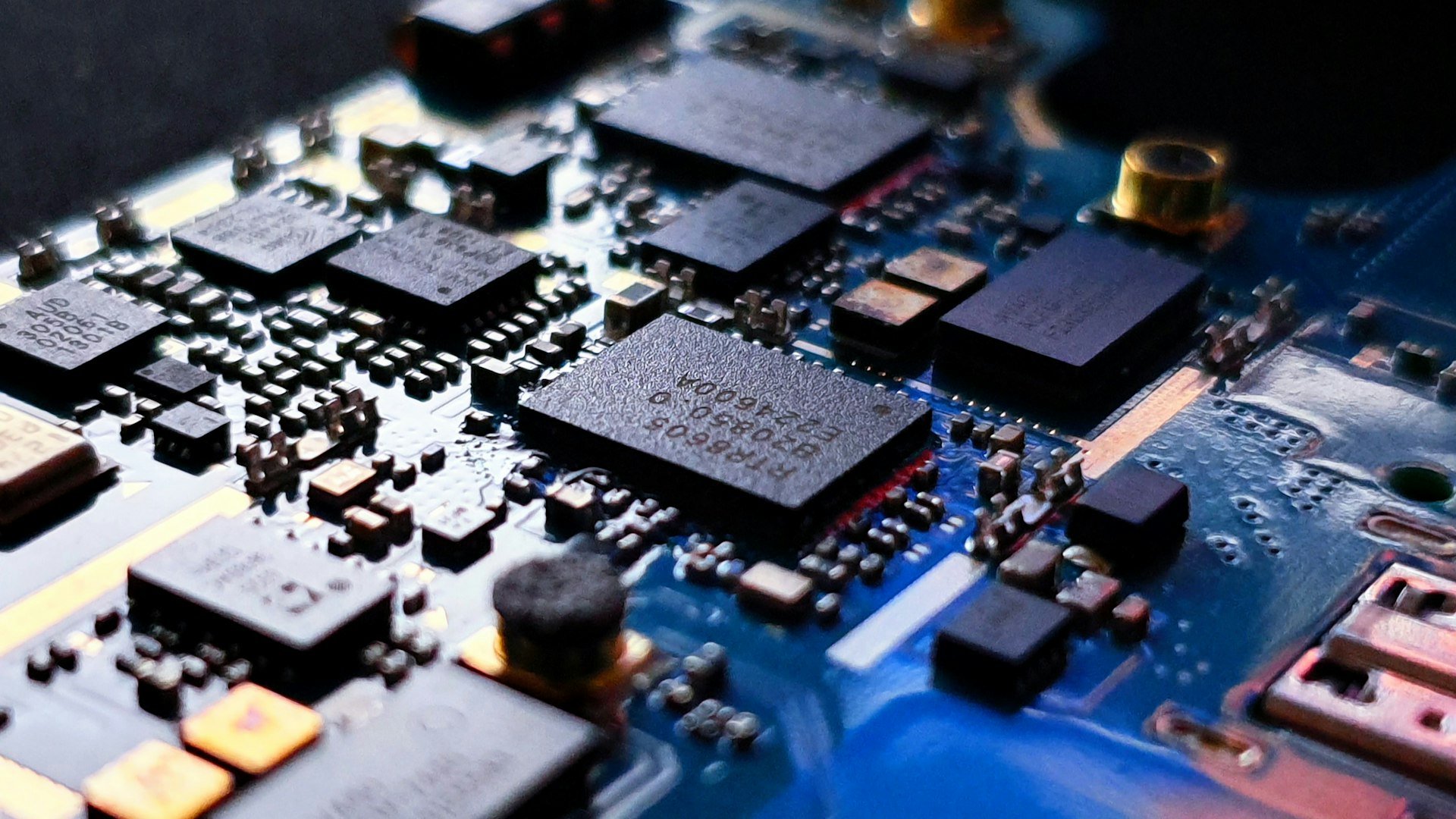 Blue-toned circuit board close-up
