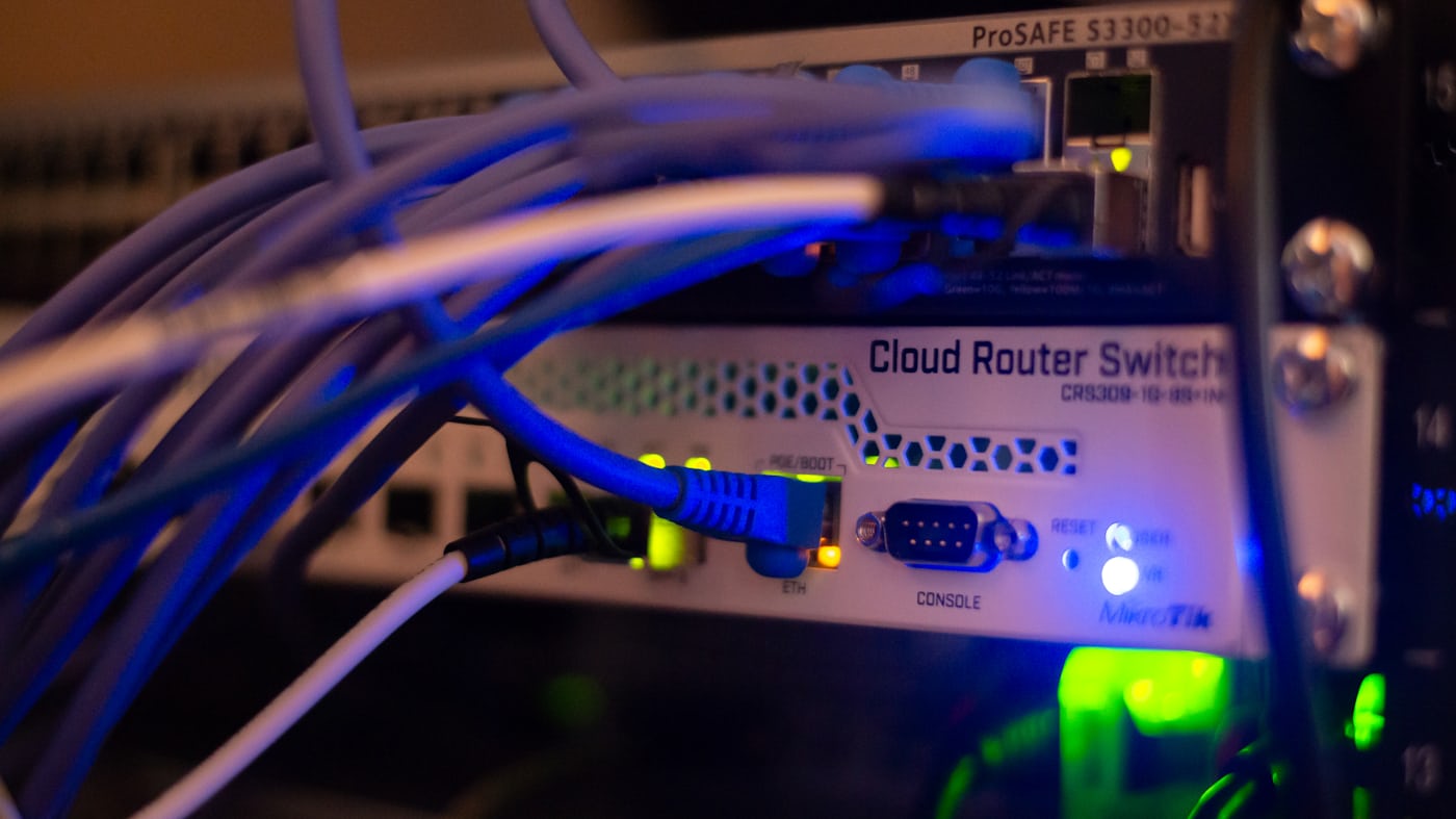 Network cables patched into a server rack