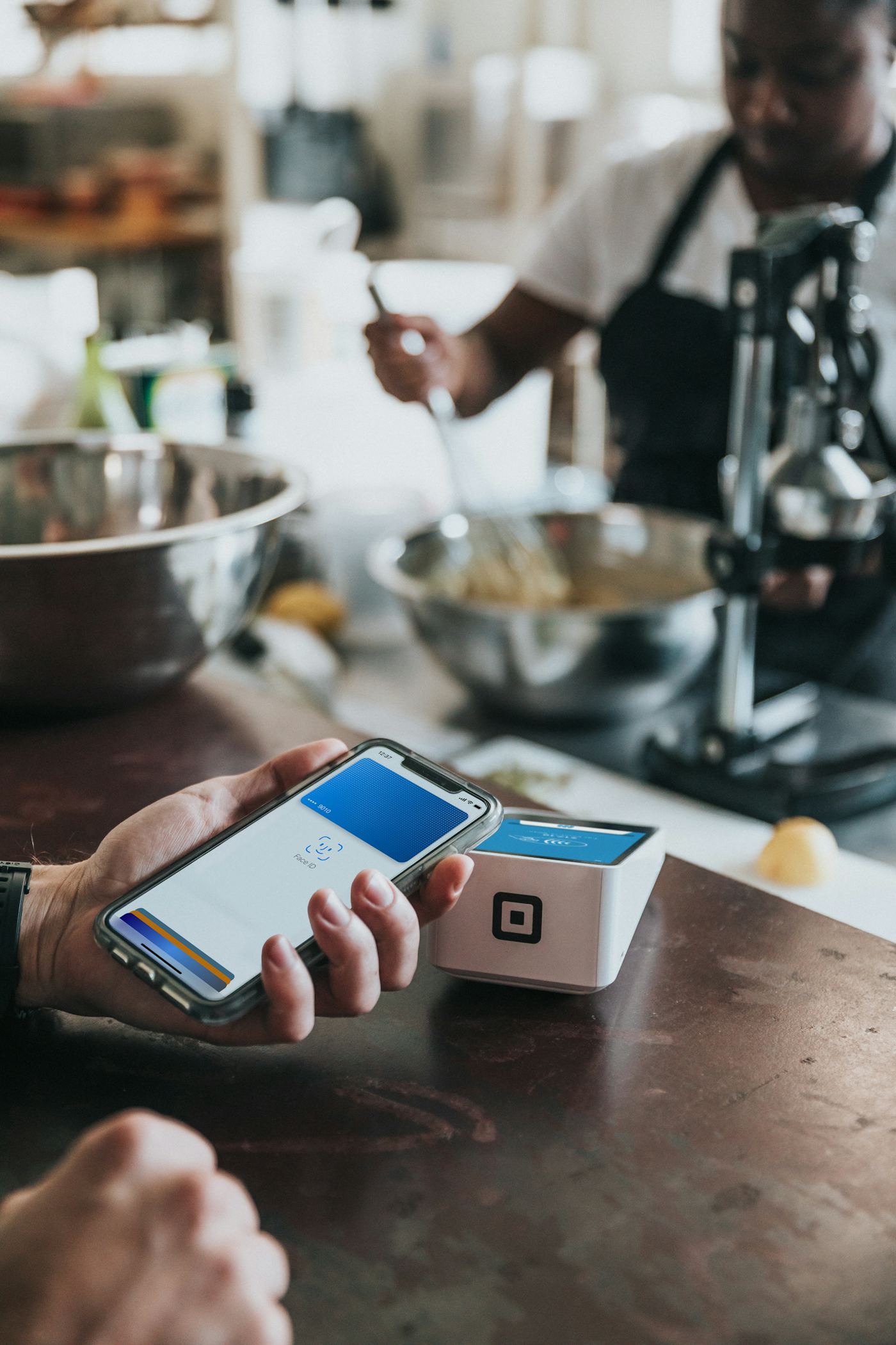 A phone showing a payment and subscription screen