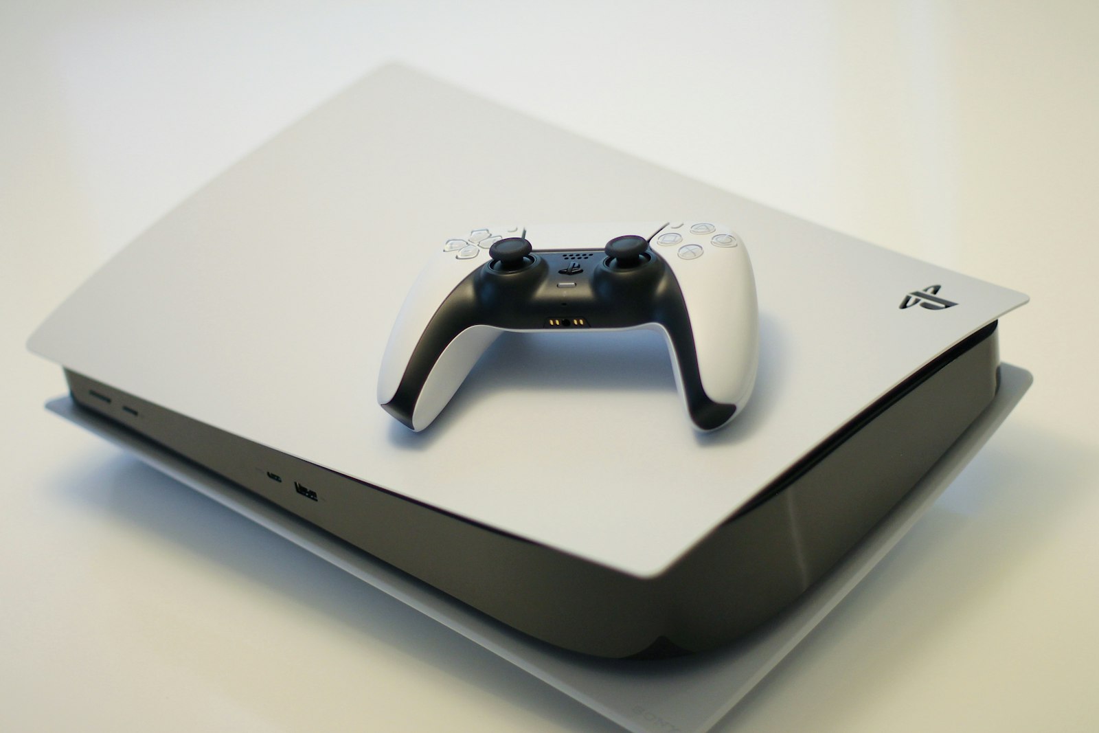 A PlayStation 5 console and controller